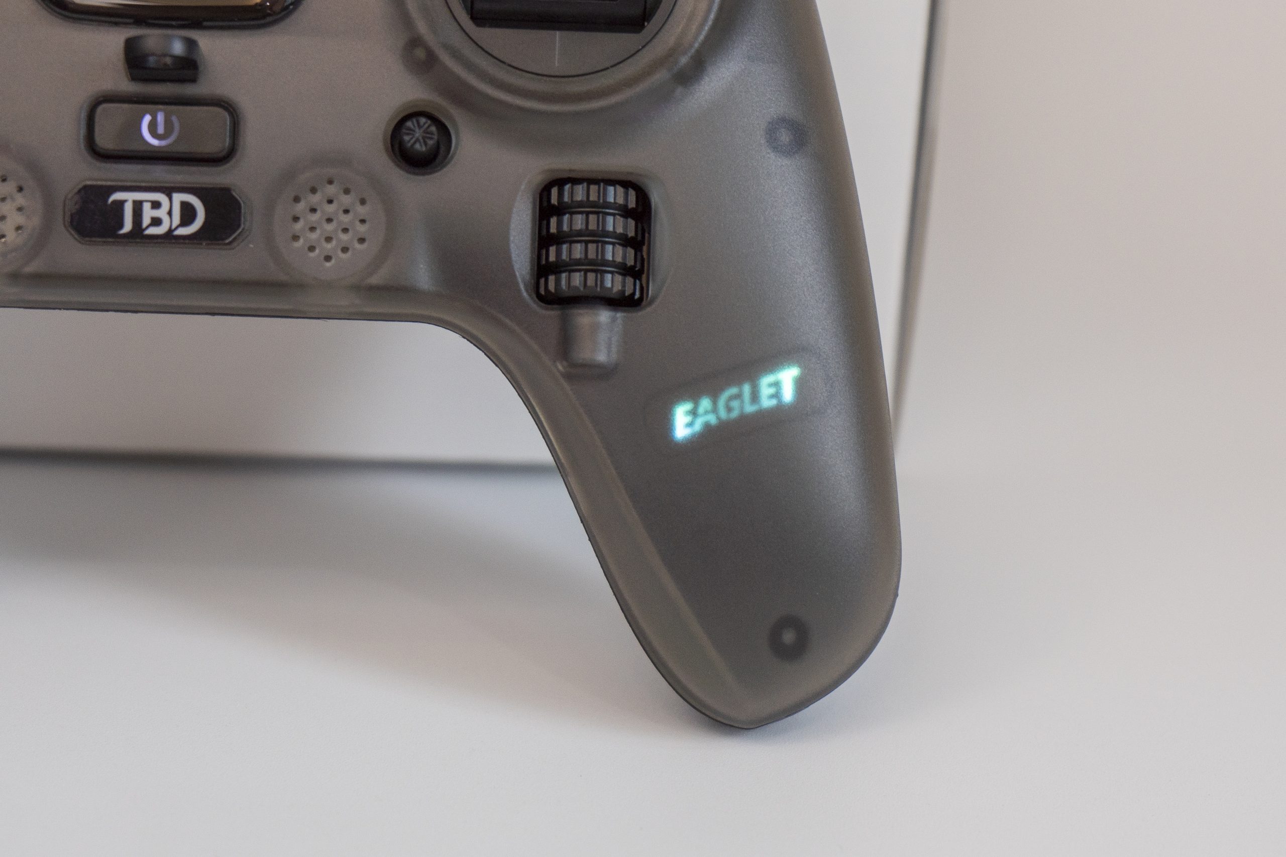 Illuminated right grip and roller control